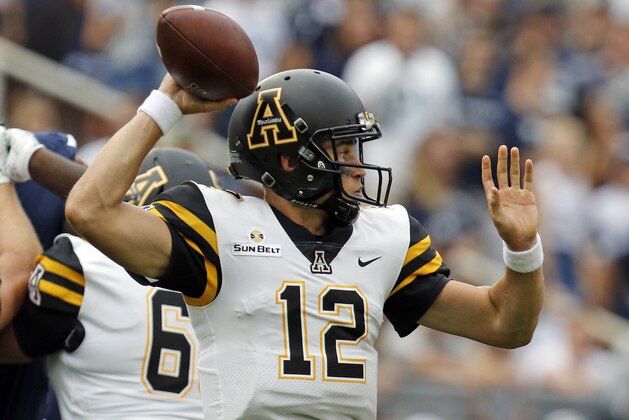 STATE COLLEGE, PA - SEPTEMBER 01:  Zac Thomas #12 of the Appalachian State Mountaineers drops back to pass against the Penn State Nittany Lions on September 1, 2018 at Beaver Stadium in State College, Pennsylvania.  (Photo by Justin K. Aller/Getty Images)