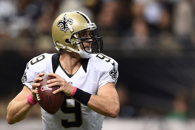 NEW ORLEANS, LA - OCTOBER 04:  Drew Brees #9 of the New Orleans Saints looks to pass during a game against the Dallas Cowboys at the Mercedes-Benz Superdome on October 4, 2015 in New Orleans, Louisiana.  New Orleans defeated Dallas 26-20.  (Photo by Stacy Revere/Getty Images)