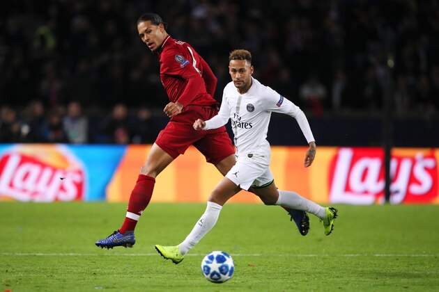 PARIS, FRANCE - NOVEMBER 28:  Neymar of Paris Saint-Germain competes with Virgil van Dijk of Liverpool during the Group C match of the UEFA Champions League between Paris Saint-Germain and Liverpool at Parc des Princes on November 28, 2018 in Paris, France. (Photo by Matthew Ashton - AMA/Getty Images)