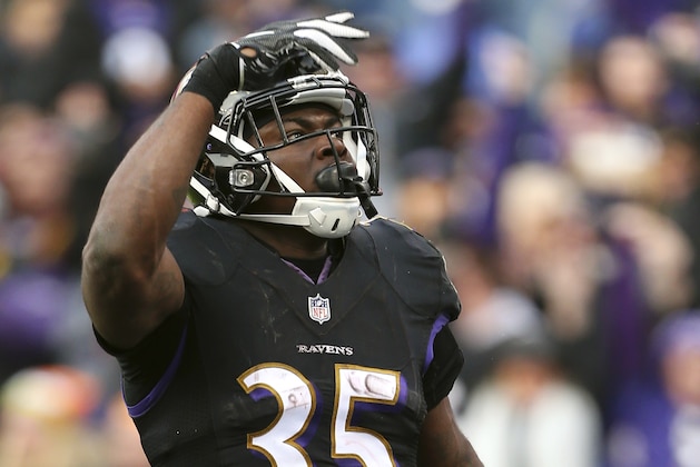 Baltimore Ravens running back Gus Edwards (35) celebrates after rushing for a touchdown against the Cincinnati Bengals during an NFL football game on Sunday, Nov. 18, 2018, in Baltimore. (AP Photo/Rich Schultz)