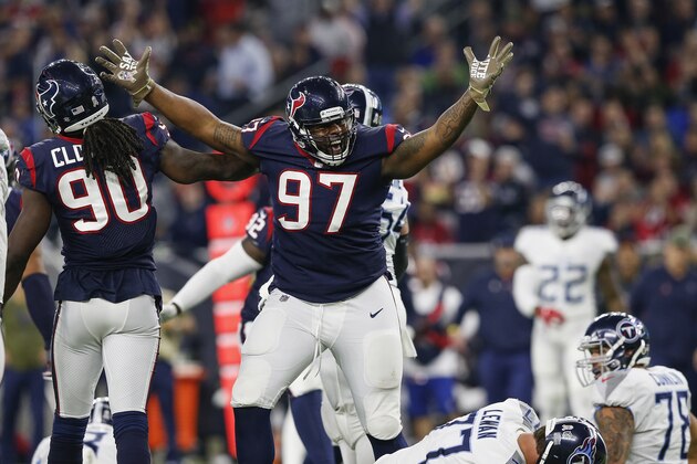HOUSTON, TX - NOVEMBER 26:  Angelo Blackson #97 of the Houston Texans celebrates after a sack in the third quarter against the Tennessee Titans at NRG Stadium on November 26, 2018 in Houston, Texas.  (Photo by Tim Warner/Getty Images)