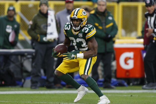 Green Bay Packers' Aaron Jones runs during the first half of an NFL football game against the Miami Dolphins Sunday, Nov. 11, 2018, in Green Bay, Wis. (AP Photo/Matt Ludtke)