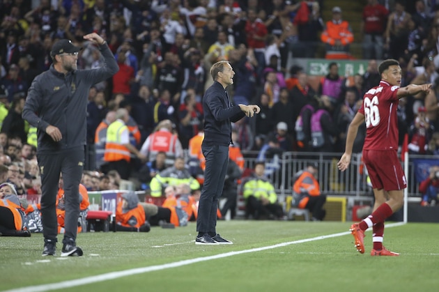 LIVERPOOL, ENGLAND - SEPTEMBER 18: Coach of PSG Thomas Tuchel (center), coach of Liverpool Jurgen Klopp (left), Trent Alexander-Arnold of Liverpool during the Group C match of the UEFA Champions League between Liverpool FC and Paris Saint-Germain (PSG) at Anfield on September 18, 2018 in Liverpool, United Kingdom. (Photo by Jean Catuffe/Getty Images)