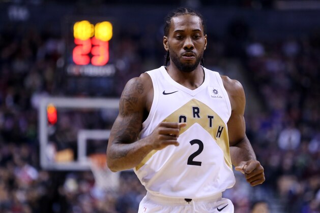 TORONTO, ON - NOVEMBER 23:  Kawhi Loenard #2 of the Toronto Raptors looks on during the first half of an NBA game against the Washington Wizards at Scotiabank Arena on November 23, 2018 in Toronto, Canada.  NOTE TO USER: User expressly acknowledges and agrees that, by downloading and or using this photograph, User is consenting to the terms and conditions of the Getty Images License Agreement.  (Photo by Vaughn Ridley/Getty Images)