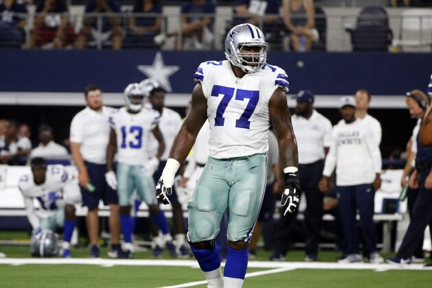 Dallas Cowboys offensive tackle Tyron Smith (77) walks on the field during the first half of a preseason NFL Football game against the Cincinnati Bengals in Arlington, Texas, Saturday, Aug. 18, 2018. (AP Photo/Michael Ainsworth)