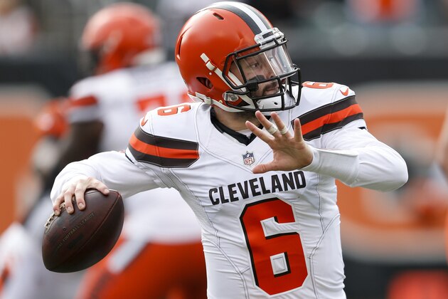 FILE - In this Nov. 25, 2018 file photo Cleveland Browns quarterback Baker Mayfield looks to pass in the first half of an NFL football game against the Cincinnati Bengals in Cincinnati. The Browns have done a great job of protecting Mayfield recently, and haven't allowed a sack in 125 snaps, the longest active streak in the NFL. Things will get more difficult for the Browns (4-6-1) on Sunday, Dec. 2, 2018 when they visit the Houston Texans (8-3) and their defense led by pass-rushing stars J.J. Watt and Jadeveon Clowney. Watt is tied for second in the NFL with 11 1/2 sacks and Clowney has seven. (AP Photo/Gary Landers, file)