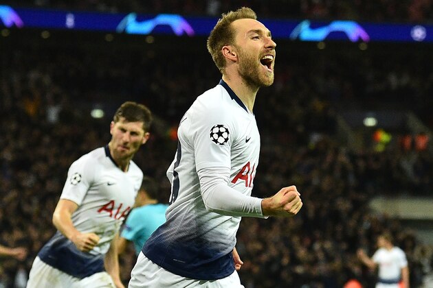 Tottenham Hotspur's Danish midfielder Christian Eriksen celebrates after scoring the opening goal of the UEFA Champions League group B football match between Tottenham Hotspur and Inter Milan at Wembley Stadium in London, on November 28, 2018. (Photo by Glyn KIRK / AFP)        (Photo credit should read GLYN KIRK/AFP/Getty Images)