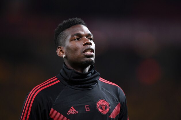 MANCHESTER, ENGLAND - NOVEMBER 27: Paul Pogba of Manchester United looks on prior to the UEFA Champions League Group H match between Manchester United and BSC Young Boys at Old Trafford on November 27, 2018 in Manchester, United Kingdom. (Photo by Laurence Griffiths/Getty Images)