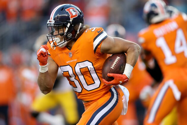 DENVER, CO - NOVEMBER 25:  Phillip Lindsay #30 of the Denver Broncos carries the ball against the Pittsburgh Steelers at Broncos Stadium at Mile High  on November 25, 2018 in Denver, Colorado.  (Photo by Matthew Stockman/Getty Images)