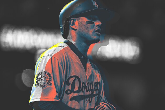 Los Angeles Dodgers' Manny Machado stands in the dugout after Game 5 of baseball's World Series against the Los Angeles Dodgers on Sunday, Oct. 28, 2018, in Los Angeles. The Red Sox won 5-1 to win the series 4 game to 1. (AP Photo/Jae C. Hong)