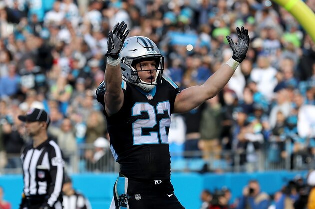 CHARLOTTE, NC - NOVEMBER 25:  Christian McCaffrey #22 of the Carolina Panthers reacts after scoring a touchdown against the Seattle Seahawks in the third quarter during their game at Bank of America Stadium on November 25, 2018 in Charlotte, North Carolina.  (Photo by Streeter Lecka/Getty Images)