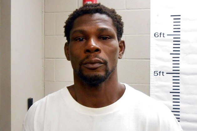 This booking photo released by the Maumelle Police Department shows Jermain Taylor. Police in the Little Rock suburb of Maumelle, Ark., say Taylor 38, and a former middleweight boxing champion, was arrested at his home around 3 a.m. Tuesday after allegedly biting a woman’s arm and face and threatening to kill her.  He was later released. Taylor  is currently serving a six-year suspended sentence after pleading guilty to nine felony charges in 2015, including a shooting that critically wounded his cousin, Tyrone DaWayne Hinton.. (Maumelle Police Department via AP)