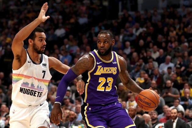 DENVER, CO - NOVEMBER 27:  Lebron James #23 of the Los Angeles Lakers drives to the basket against Trey Lyles #7 of the Denver Nuggets in the first quarter at the Pepsi Center on November 27, 2018 in Denver, Colorado.  (Photo by Matthew Stockman/Getty Images) NOTE TO USER: User expressly acknowledges and agrees that, by downloading and or using this photograph, User is consenting to the terms and conditions of the Getty Images License Agreement.  (Photo by Matthew Stockman/Getty Images)