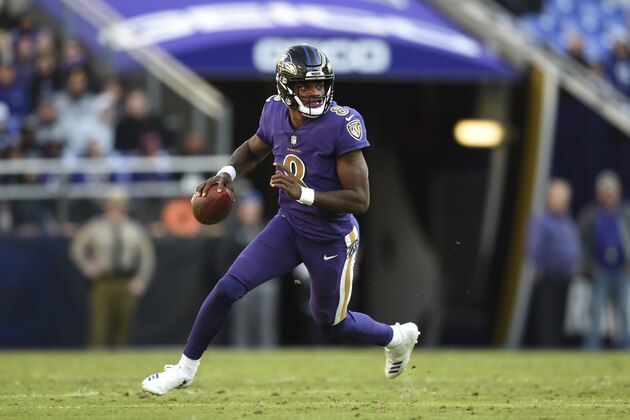 Baltimore Ravens quarterback Lamar Jackson looks for a receiver in the second half of an NFL football game against the Oakland Raiders, Sunday, Nov. 25, 2018, in Baltimore. (AP Photo/Gail Burton)