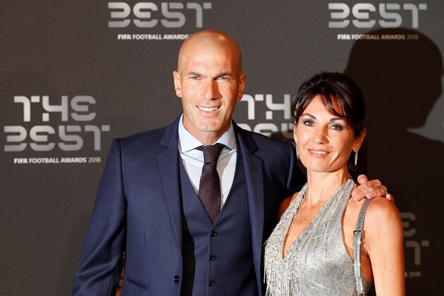 Real Madrid's French coach Zinedine Zidane and his wife Veronique arrive for The Best FIFA Football Awards ceremony, on September 24, 2018 in London. (Photo by Adrian DENNIS / AFP)        (Photo credit should read ADRIAN DENNIS/AFP/Getty Images)