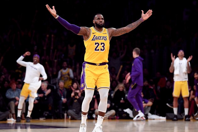 LOS ANGELES, CA - NOVEMBER 29:  LeBron James #23 of the Los Angeles Lakers celebrates his three pointer during a 104-96 win over the Indiana Pacers at Staples Center on November 29, 2018 in Los Angeles, California.  NOTE TO USER: User expressly acknowledges and agrees that, by downloading and or using this photograph, User is consenting to the terms and conditions of the Getty Images License Agreement.  (Photo by Harry How/Getty Images)