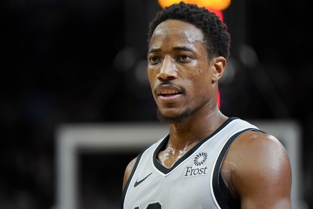 San Antonio Spurs' DeMar DeRozan walks upcourt during the second half of an NBA basketball game against the New Orleans Pelicans, Saturday, Nov. 3, 2018, in San Antonio. San Antonio won 109-95. (AP Photo/Darren Abate)