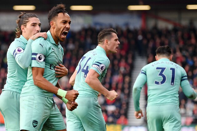 BOURNEMOUTH, ENGLAND - NOVEMBER 25:  Pierre-Emerick Aubameyang of Arsenal celebrates after scoring his team's second goal with Hector Bellerin during the Premier League match between AFC Bournemouth and Arsenal FC at Vitality Stadium on November 25, 2018 in Bournemouth, United Kingdom.  (Photo by Dan Mullan/Getty Images)