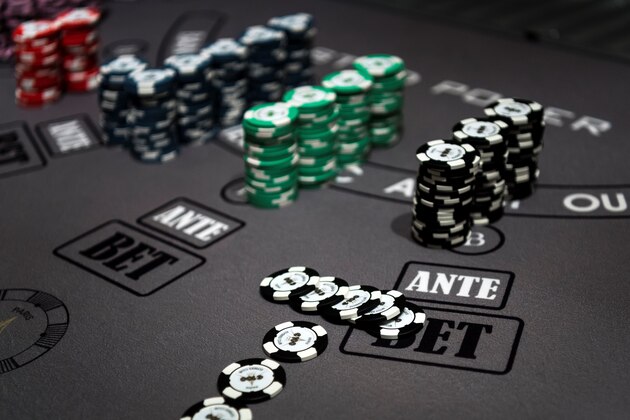 Chips are seen at a three card poker table at the 'Paris Elysees Club', the first 'gaming club' to open its doors in the French capital in Paris, on May 9, 2018. - Casinos were banned in the French capital in 1920, but a new law allows clubs de jeux under strict conditions to avoid fraud and money laundering. Unlike cercles de jeux, which are private gambling clubs classed as a not-for-profit organisations, clubs de jeux must register as a commercial company in order to improve the traceability of funds. (Photo by Lionel BONAVENTURE / AFP)        (Photo credit should read LIONEL BONAVENTURE/AFP/Getty Images)