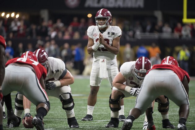 ATLANTA, GA - JANUARY 08: Tua Tagovailoa #13 of the Alabama Crimson Tide commands the offense against the Georgia Bulldogs during the College Football Playoff National Championship held at Mercedes-Benz Stadium on January 8, 2018 in Atlanta, Georgia. Alabama defeated Georgia 26-23 for the national title. (Photo by Jamie Schwaberow/Getty Images)