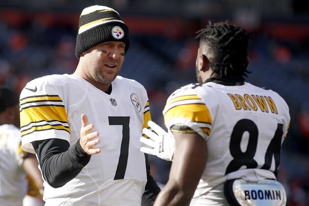 Pittsburgh Steelers wide receiver Antonio Brown (84) greets quarterback Ben Roethlisberger (7) prior to an NFL football game against the Denver Broncos, Sunday, Nov. 25, 2018, in Denver. (AP Photo/David Zalubowski)