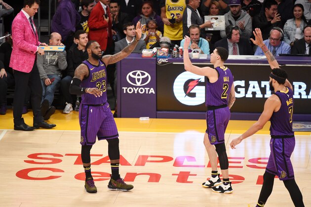 LOS ANGELES, CA - NOVEMBER 30: LeBron James #23 and Lonzo Ball #2 of the Los Angeles Lakers high five during the game against the Dallas Mavericks on November 30, 2018 at STAPLES Center in Los Angeles, California. NOTE TO USER: User expressly acknowledges and agrees that, by downloading and/or using this photograph, user is consenting to the terms and conditions of the Getty Images License Agreement. Mandatory Copyright Notice: Copyright 2018 NBAE (Photo by Adam Pantozzi/NBAE via Getty Images) LOS ANGELES, CA - NOVEMBER 30: LeBron James #23 and Lonzo Ball #2 of the Los Angeles Lakers high five during the game against the Dallas Mavericks on November 30, 2018 at STAPLES Center in Los Angeles, California. NOTE TO USER: User expressly acknowledges and agrees that, by downloading and/or using this photograph, user is consenting to the terms and conditions of the Getty Images License Agreement. Mandatory Copyright Notice: Copyright 2018 NBAE (Photo by Adam Pantozzi/NBAE via Getty Images)