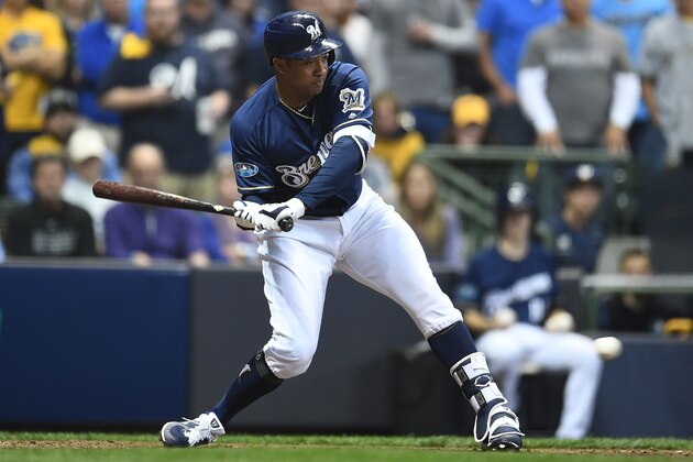 MILWAUKEE, WI - OCTOBER 05:  Jonathan Schoop #5 of the Milwaukee Brewers at bat during Game Two of the National League Divisional Series against the Colorado Rockies at Miller Park on October 5, 2018 in Milwaukee, Wisconsin.  The Brewers defeated the Rockies 4-0.  (Photo by Stacy Revere/Getty Images)