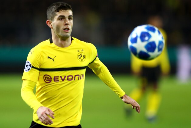 DORTMUND, GERMANY - NOVEMBER 28: Christian Pulisic of Dortmund runs with the ball during the Group A match of the UEFA Champions League between Borussia Dortmund and Club Brugge at Signal Iduna Park on November 28, 2018 in Dortmund, Germany. (Photo by Martin Rose/Getty Images)