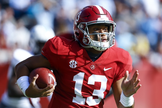 Alabama quarterback Tua Tagovailoa (13) carries the ball during the first half of an NCAA college football game against Citadel, Saturday, Nov. 17, 2018, in Tuscaloosa, Ala. (AP Photo/Butch Dill)