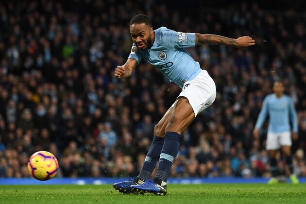 Manchester City's English midfielder Raheem Sterling has an unsuccessful shot on goal during the English Premier League football match between Manchester City and Bournemouth at the Etihad Stadium in Manchester, north west England, on December 1, 2018. (Photo by Paul ELLIS / AFP) / RESTRICTED TO EDITORIAL USE. No use with unauthorized audio, video, data, fixture lists, club/league logos or 'live' services. Online in-match use limited to 120 images. An additional 40 images may be used in extra time. No video emulation. Social media in-match use limited to 120 images. An additional 40 images may be used in extra time. No use in betting publications, games or single club/league/player publications. /         (Photo credit should read PAUL ELLIS/AFP/Getty Images)