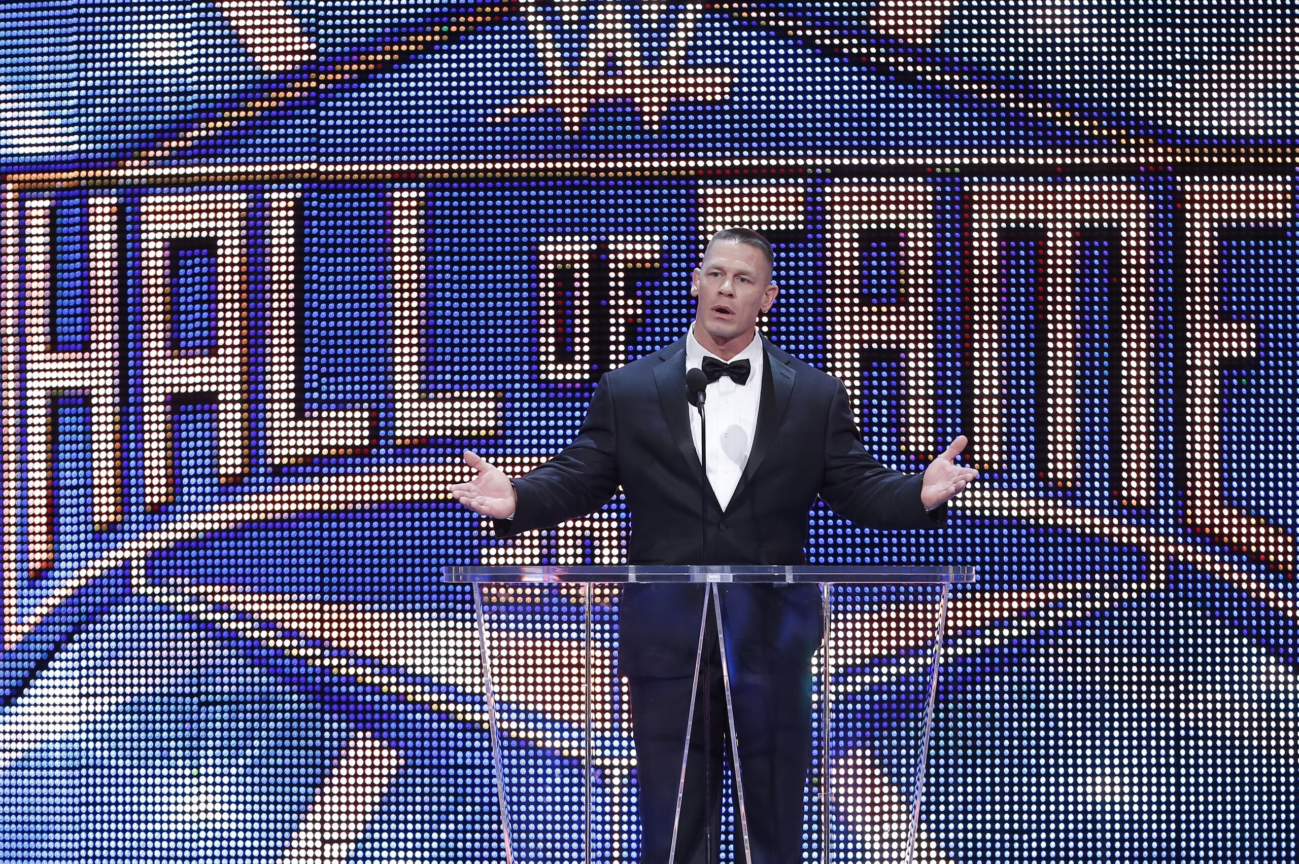 IMAGE DISTRIBUTED FOR WWE - WWE superstar John Cena introduces Snoop Dogg into the WWE Hall of Fame on Saturday, April 2, 2016 in Dallas. (Brandon Wade/AP Images for WWE)