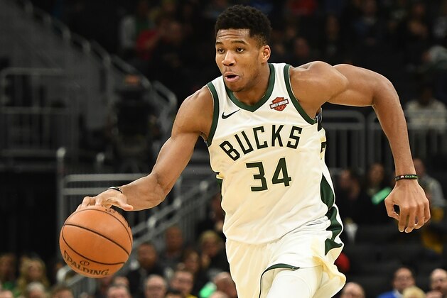 MILWAUKEE, WISCONSIN - NOVEMBER 28:  Giannis Antetokounmpo #34 of the Milwaukee Bucks handles the ball during a game against the Chicago Bulls at Fiserv Forum on November 28, 2018 in Milwaukee, Wisconsin. NOTE TO USER: User expressly acknowledges and agrees that, by downloading and or using this photograph, User is consenting to the terms and conditions of the Getty Images License Agreement. (Photo by Stacy Revere/Getty Images)