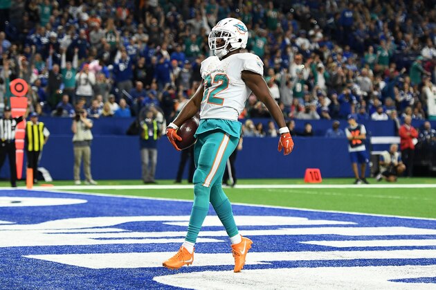 INDIANAPOLIS, INDIANA - NOVEMBER 25:   Kenyan Drake #32 of the Miami Dolphins celebrates a touchdown during a game against the Indianapolis Colts at Lucas Oil Stadium on November 25, 2018 in Indianapolis, Indiana.  The Colts defeated the Dolphins 27-24. (Photo by Stacy Revere/Getty Images)