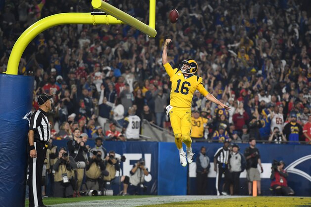 LOS ANGELES, CA - NOVEMBER 19:  Quarterback Jared Goff #16 of the Los Angeles Rams celebrates his touchdown on a seven yard rush by dunking the football between the goal posts during the third quarter of the game against the Kansas City Chiefs at Los Angeles Memorial Coliseum on November 19, 2018 in Los Angeles, California.  (Photo by Kevork Djansezian/Getty Images)