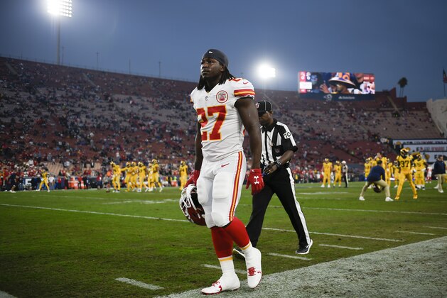 Kansas City Chiefs running back Kareem Hunt walks off the field prior to an NFL football game against the Los Angeles Rams Monday, Nov. 19, 2018, in Los Angeles. (AP Photo/Kelvin Kuo)