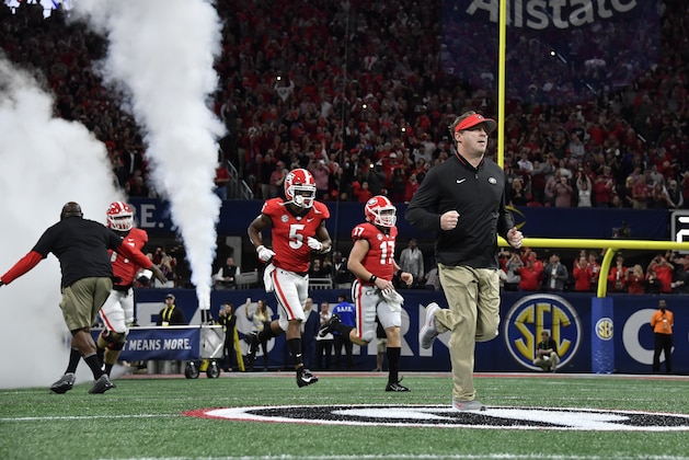 Georgia head coach Kirby Smart takes the field with the team before the first half of the Southeastern Conference championship NCAA college football game between Georgia and Alabama, Saturday, Dec. 1, 2018, in Atlanta. (AP Photo/John Amis)