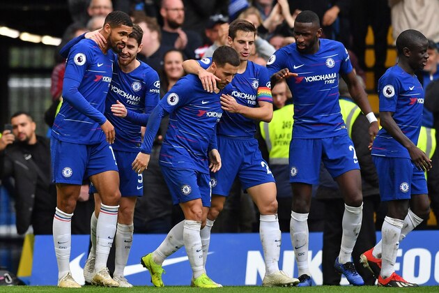 Chelsea's English midfielder Ruben Loftus-Cheek (L) celebrates with teammates after scoring their second goal during the English Premier League football match between Chelsea and Fulham at Stamford Bridge in London on December 2, 2018. (Photo by Ben STANSALL / AFP) / RESTRICTED TO EDITORIAL USE. No use with unauthorized audio, video, data, fixture lists, club/league logos or 'live' services. Online in-match use limited to 120 images. An additional 40 images may be used in extra time. No video emulation. Social media in-match use limited to 120 images. An additional 40 images may be used in extra time. No use in betting publications, games or single club/league/player publications. /         (Photo credit should read BEN STANSALL/AFP/Getty Images)