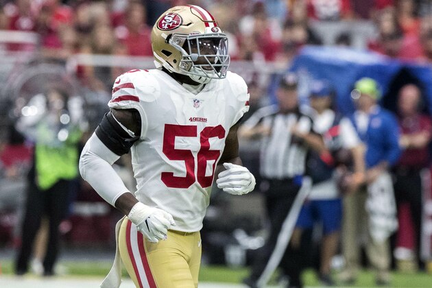 FILE - In this Oct. 28, 2018, file photo, San Francisco 49ers' Reuben Foster (56) jogs on the field during the first half of an NFL football game against the Arizona Cardinals in Glendale, Ariz. The Washington Redskins claimed Foster off waivers on Tuesday, Nov. 27, 2018, after the 49ers released the linebacker following a domestic violence arrest. The team says conversations with former Alabama teammates led to the decision to claim Foster. (AP Photo/Darryl Webb, File)