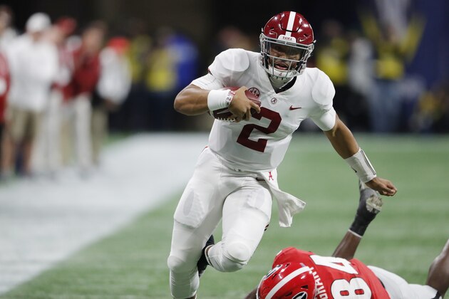 Alabama quarterback Jalen Hurts (2) runs past Georgia linebacker Walter Grant (84) during the second half of the Southeastern Conference championship NCAA college football game, Saturday, Dec. 1, 2018, in Atlanta. (AP Photo/John Bazemore)