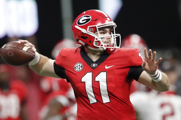 Georgia quarterback Jake Fromm (11) passes against Alabama during the second half of the Southeastern Conference championship NCAA college football game, Saturday, Dec. 1, 2018, in Atlanta. (AP Photo/John Bazemore)