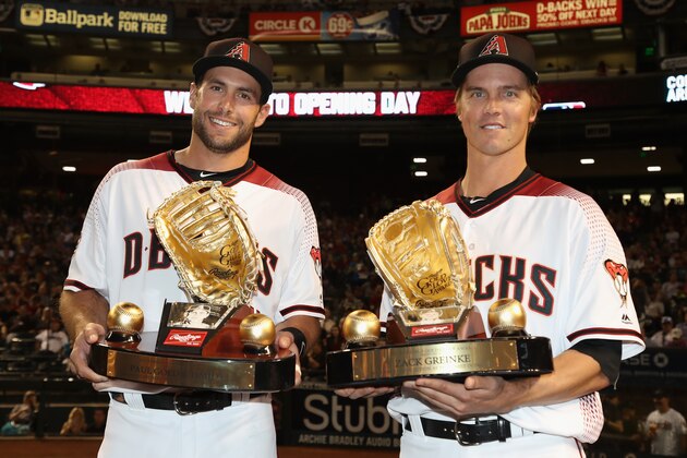 PHOENIX, AZ - MARCH 29:  Paul Goldschmidt #44 and Zack Greinke #21 of the Arizona Diamondbacks pose with their golden glove awards before the opening day MLB game against the Colorado Rockies at Chase Field on March 29, 2018 in Phoenix, Arizona.  (Photo by Christian Petersen/Getty Images)