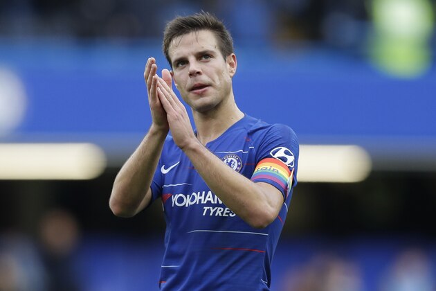 Chelsea's Cesar Azpilicueta applauds fans at the end of the English Premier League soccer match between Chelsea and Fulham at Stamford Bridge stadium in London, Sunday, Dec. 2, 2018. (AP Photo/Kirsty Wigglesworth)