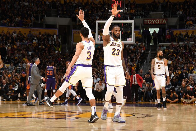 LOS ANGELES, CA - DECEMBER 2: Josh Hart #3 and LeBron James #23 of the Los Angeles Lakers hi-five on December 2, 2018 at STAPLES Center in Los Angeles, California. NOTE TO USER: User expressly acknowledges and agrees that, by downloading and/or using this Photograph, user is consenting to the terms and conditions of the Getty Images License Agreement. Mandatory Copyright Notice: Copyright 2018 NBAE (Photo by Andrew D. Bernstein/NBAE via Getty Images)