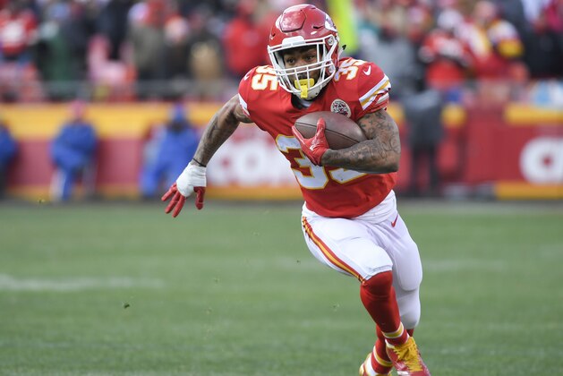 Kansas City Chiefs running back Charcandrick West (35) runs against the Miami Dolphins during the second half of an NFL football game in Kansas City, Mo., Sunday, Dec. 24, 2017. (AP Photo/Reed Hoffmann)