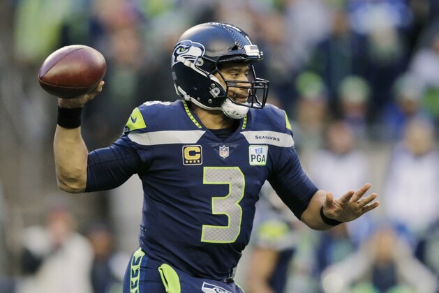 Seattle Seahawks quarterback Russell Wilson passes against the San Francisco 49ers during the second half of an NFL football game, Sunday, Dec. 2, 2018, in Seattle. (AP Photo/John Froschauer)