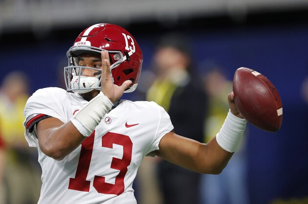 Alabama quarterback Tua Tagovailoa (13) warms up ahead of the Southeastern Conference championship NCAA college football game between Georgia and Alabama, Saturday, Dec. 1, 2018, in Atlanta. (AP Photo/John Bazemore)