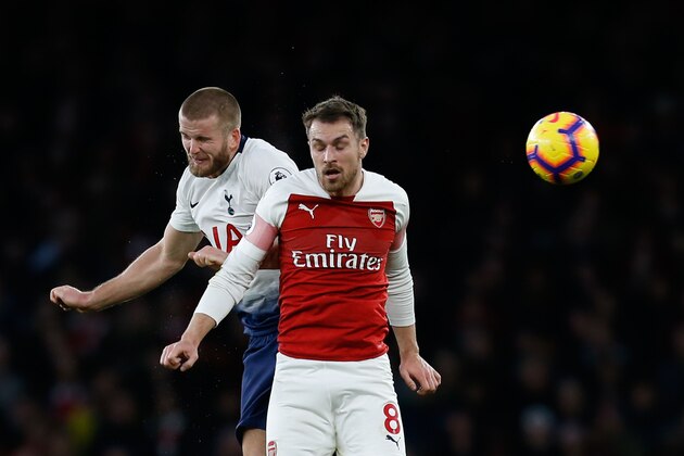 Tottenham Hotspur's English defender Eric Dier (L) vies with Arsenal's Welsh midfielder Aaron Ramsey during the English Premier League football match between Arsenal and Tottenham Hotspur at the Emirates Stadium in London on December 2, 2018. (Photo by Ian KINGTON / IKIMAGES / AFP) / RESTRICTED TO EDITORIAL USE. No use with unauthorized audio, video, data, fixture lists, club/league logos or 'live' services. Online in-match use limited to 45 images, no video emulation. No use in betting, games or single club/league/player publications.        (Photo credit should read IAN KINGTON/AFP/Getty Images)