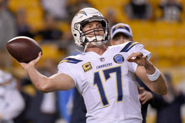 Los Angeles Chargers quarterback Philip Rivers (17) warms up before an NFL football game against the Pittsburgh Steelers, Monday, Dec. 3, 2018, in Pittsburgh. (AP Photo/Don Wright)