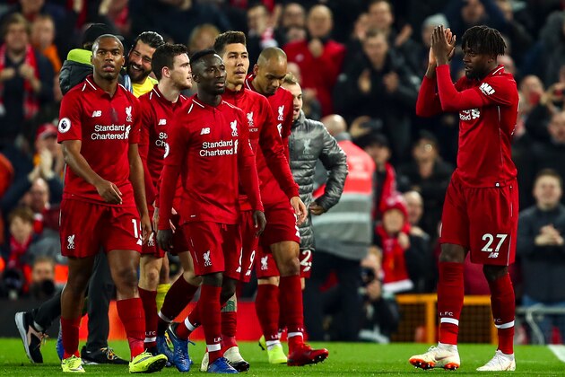 LIVERPOOL, ENGLAND - DECEMBER 02: Divock Origi of Liverpool applauds the fans at full time after scoring the winning goal to make it 1-0 during the Premier League match between Liverpool FC and Everton FC at Anfield on December 2, 2018 in Liverpool, United Kingdom. (Photo by Robbie Jay Barratt - AMA/Getty Images)