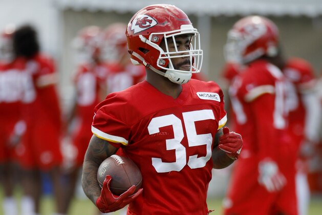 Kansas City Chiefs running back Charcandrick West runs the ball during NFL football training camp Thursday, July 26, 2018, in St. Joseph, Mo. (AP Photo/Charlie Riedel)